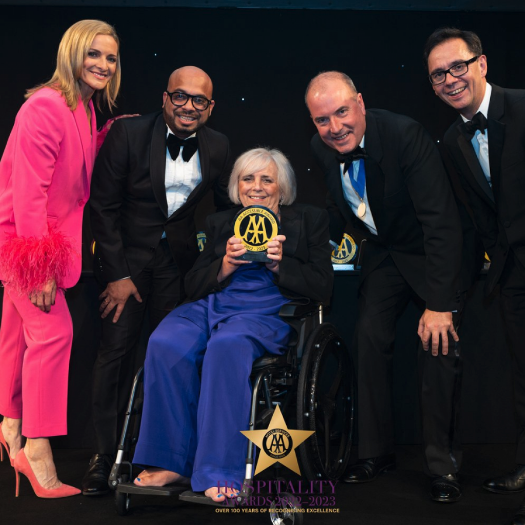FIona Jarvis with guest, holding up an award