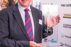 Paul Vaughan of Bespoke Hotels receives the Best Accessible Toilet Award for Mere Restaurant, London