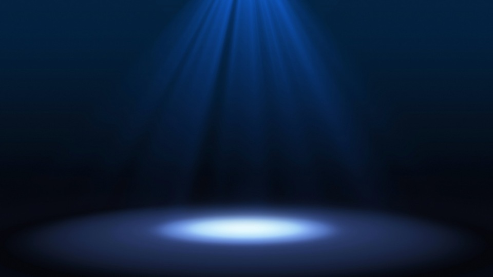 Blue spotlight on stage performance