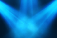 Bright colorful spotlights shine into the scene in smoke, concert background. 3d illustration