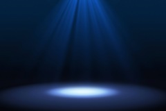 Blue spotlight on stage performance